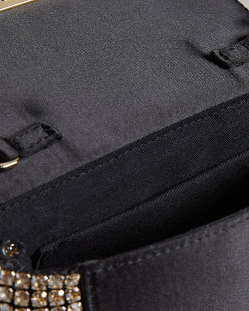 GLITERI-Bags-It's time to sparkle. Make a statement wherever you go with our sparkling GLITERI bag. Adorned with all-over crystals, this bag is sure to turn heads and add plenty of glamour to any outfit. The chain shoulder strap is both comfortable and adjustable, while the magnetic closure keeps your essentials secure. With an internal pocket for added organization, this bag is both practical and eye-catching. Crossbody bag All-over crystals Chain shoulder strap Magnetic closure Internal pocket Dimensions: